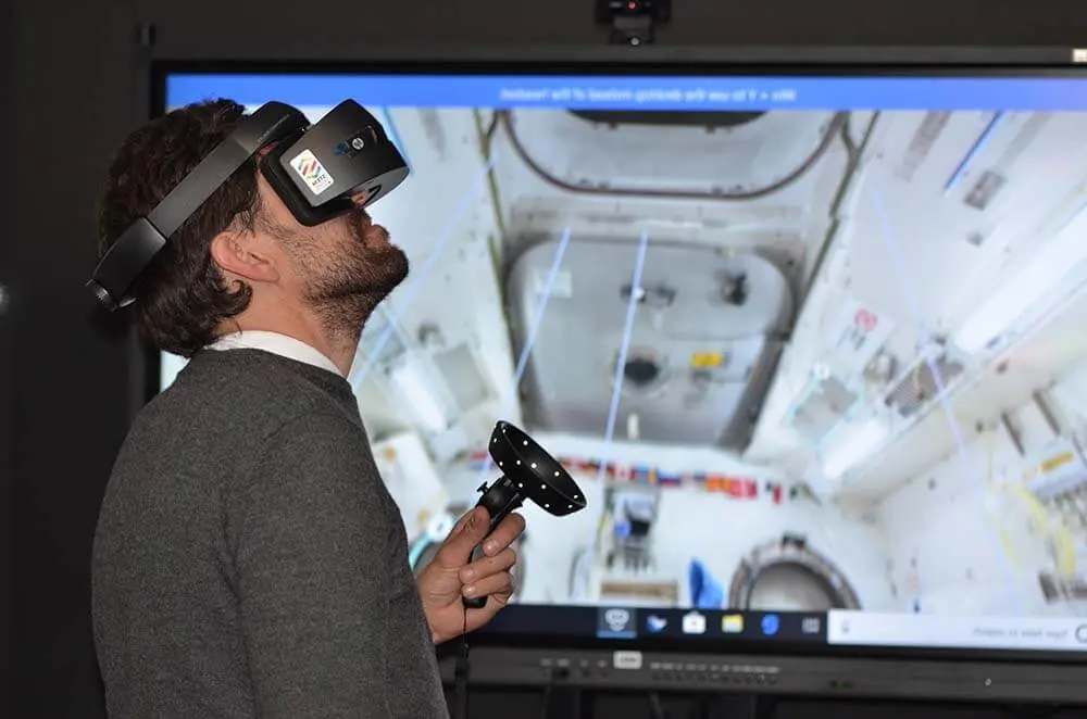 A businessman using virtual reality for corporate e-learning