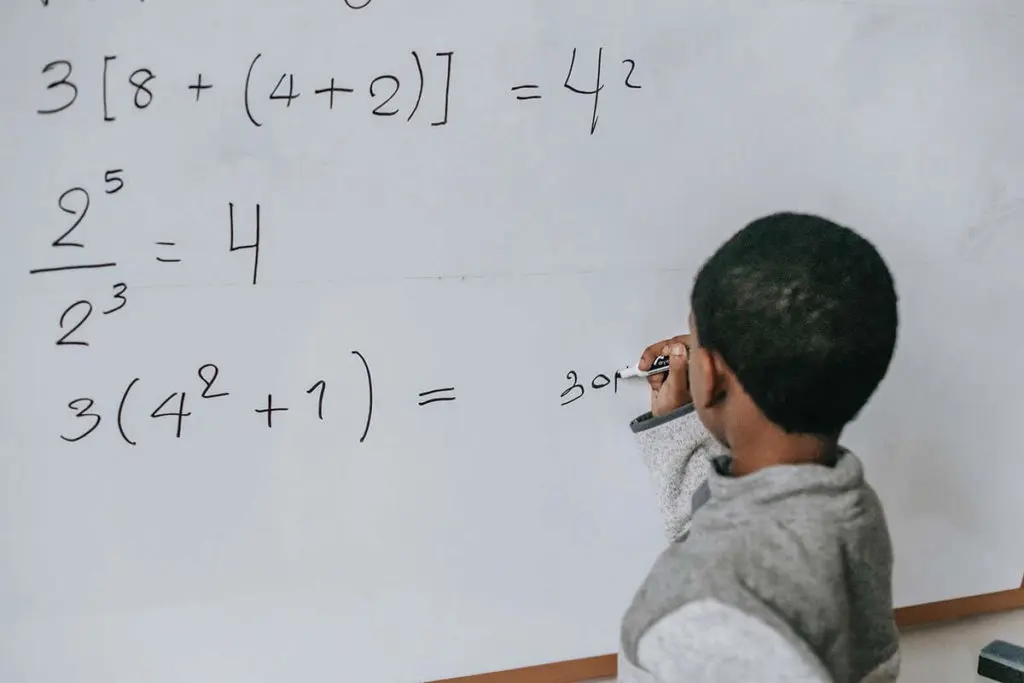 Student using a blackboard