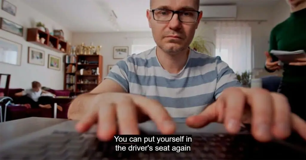 a man typing on a keyboard