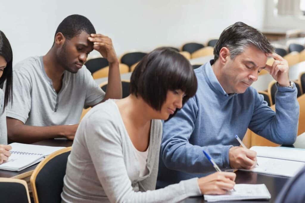 Students taking notes in class