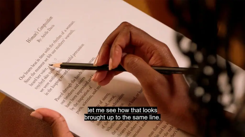 Amanda editing students' poetry and providing insightful advice