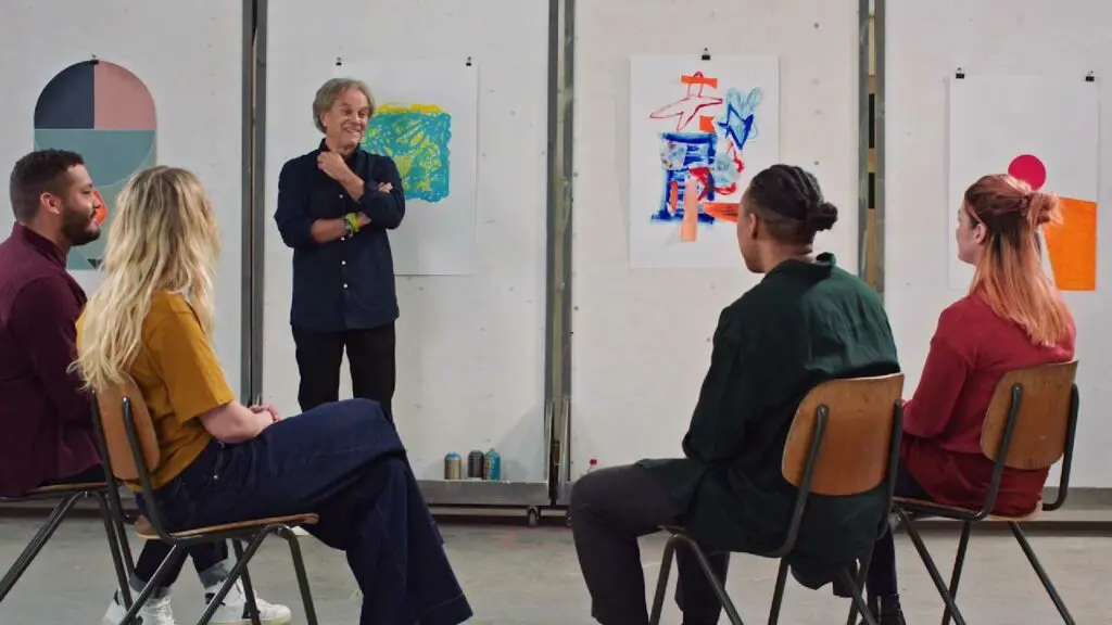 David Carson discussing a design with students