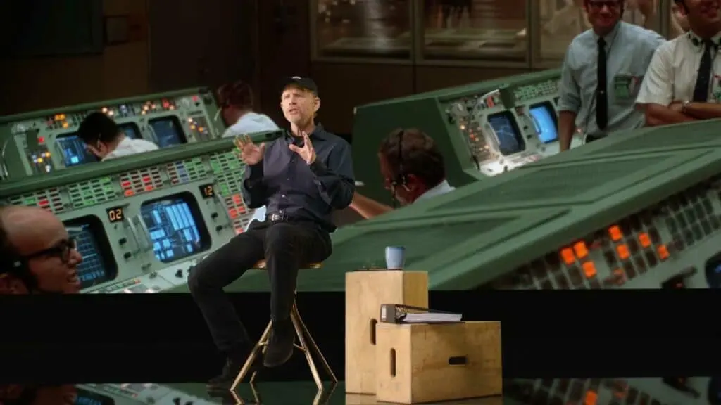 Ron Howard speaking in his MasterClass against the backdrop of one of his movies.